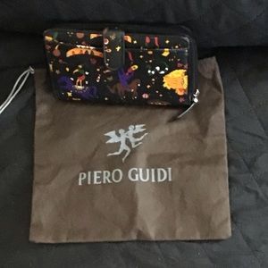 Piero Guidi wallet Magic circus